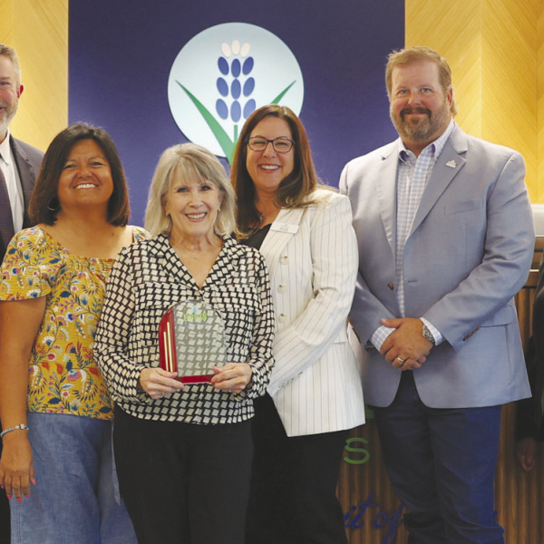 Courtesy Photos/City of Ennis Commissioners Bruce Jones, Scott Hejny and Cathy Falkenbach, retiring City Secretary Angie Wade (center), Mayor Lynda Isbell, Mayor Pro Tem David Espedal, and Commissioners Doris Polk and Eric Pierce.