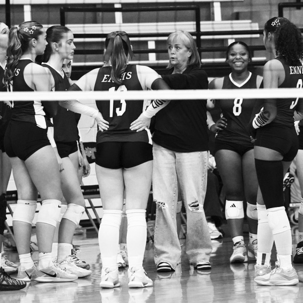 HC Kelly Henderson is the center of a team huddle at Lancaster photosbylezley.com