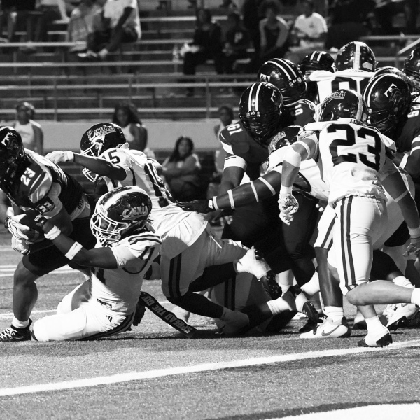 photosbylezley.com Goal Line Stand – Damion Baizar (11), Kendall Polk (15) and RJ Eddington (23) stuff J’Uan Harrison (23) on a fourth and goal.