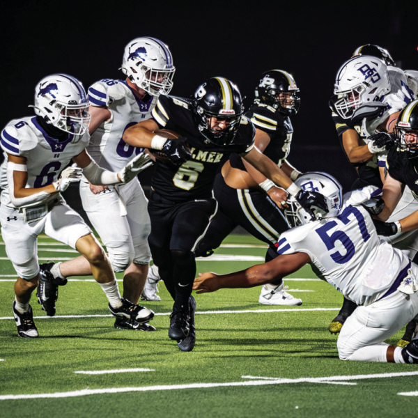 Brandon Ledbetter Photo RB Jacob Medina (6) weaves through Blooming Grove defenders.