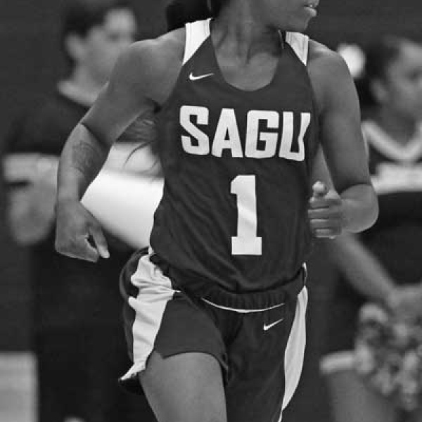 Glenn making her points for SAGU hoopsters