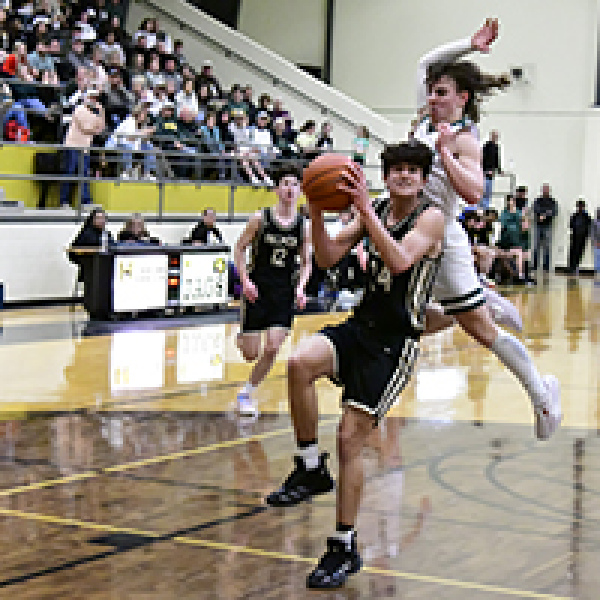 Cardiac Canines storm back, 55-52