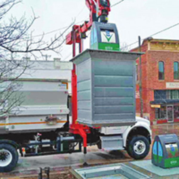 Below ground trash system begins