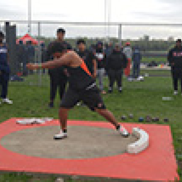 Blue breaks records in shot put, discus