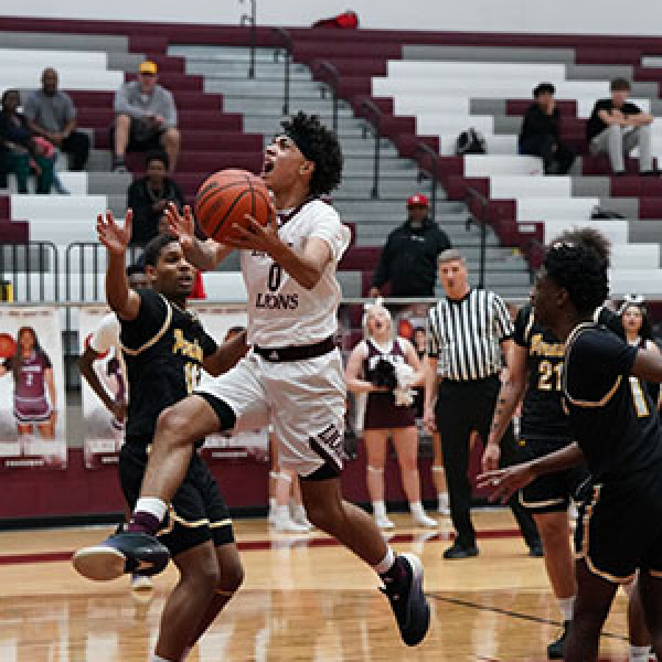 Harris’ 24 powers Ennis past Kaufman