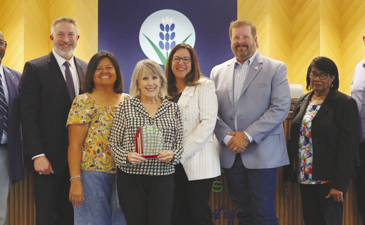 Courtesy Photos/City of Ennis Commissioners Bruce Jones, Scott Hejny and Cathy Falkenbach, retiring City Secretary Angie Wade (center), Mayor Lynda Isbell, Mayor Pro Tem David Espedal, and Commissioners Doris Polk and Eric Pierce.