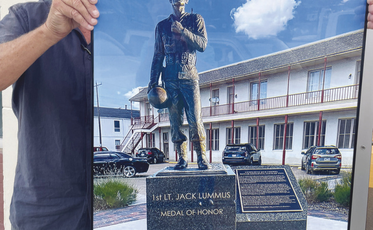 Submitted Photo Joe Muirhead holds an example of the proposed statue.