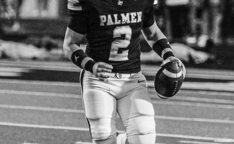 QB Sutton Maddox rolls out in search of open receivers. Jessica Cisneros Photo
