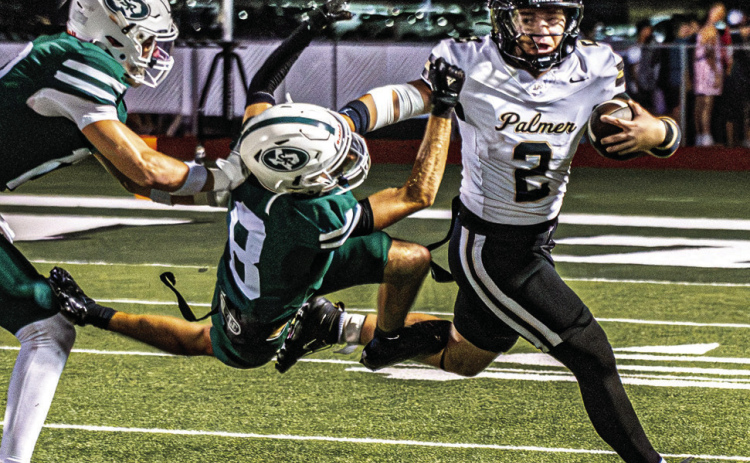 Brandon Lee Photography QB Sutton Maddox (2) stiffarms Chandler Bridges (8) of Scurry-Rosser.